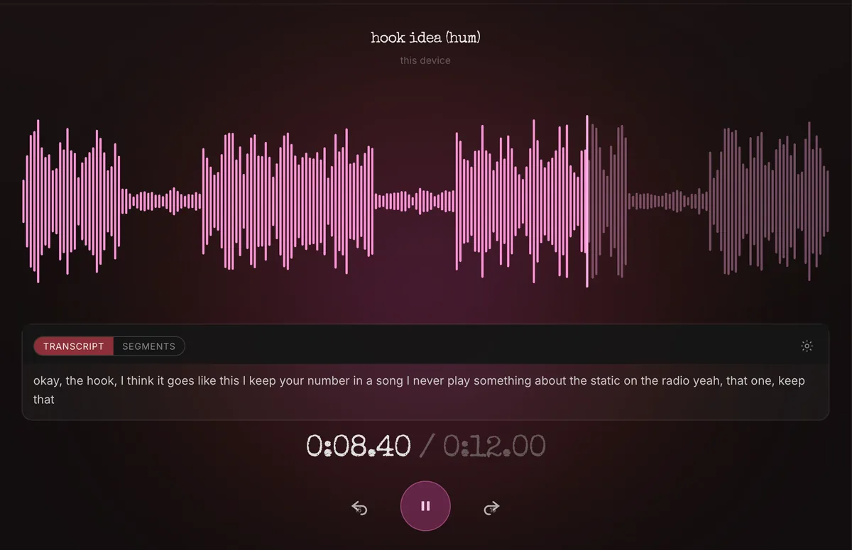 A voice memo playing, with its waveform and the words typed out underneath